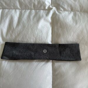 Lululemon heathered-grey headband 
Black grip on the inside